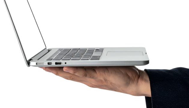 A hand supports a laptop, seen from the side with the screen open, against a black backdrop