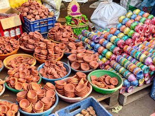 Clay lamp stall for festival celebration, Terracotta diyas or oil lamps for Diwali for sale at a market in India.