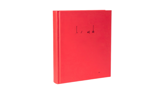 A vibrant red book stands against a black backdrop, with minimal text on the front