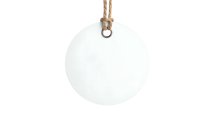 A circular white tag, suspended by a brown string, against a black background