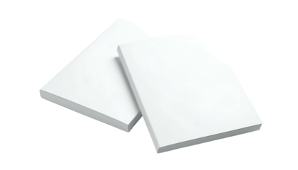 Two angled stacks of white paper with subtle shadows against a stark black backdrop