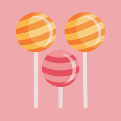 Three colorful lollipops with striped patterns on pink background