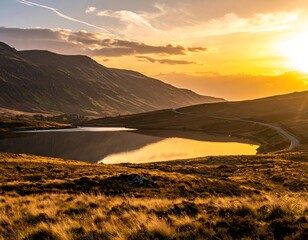 Golden hour illuminates a tranquil lake nestled among rolling hills