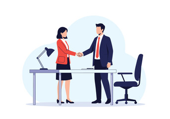 A business man and woman shaking hands over a desk with office equipment in a modern office environment.