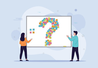 Two people standing in front of a whiteboard covered in sticky notes forming a question mark.