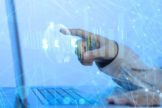 Exploring global markets through digital data analysis on a laptop screen during the day