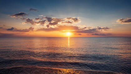 Obraz premium Serene Sunset Over The Calm And Beautiful Ocean