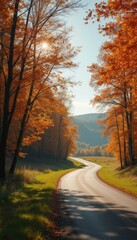 Fototapeta premium Winding road through a vibrant autumn landscape