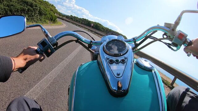 Pov of a motorcycle ride on a coastal road