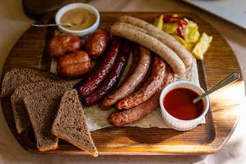 Rustic Sausage Platter with Rye and Dips