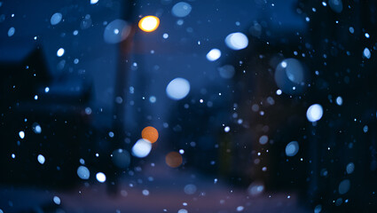 Falling snow bokeh lights night image