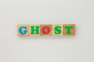 Wooden Blocks Arrange to Spell Ghost