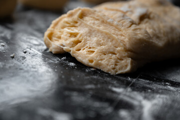 Homemade baking idea with raw dough on kitchen table
