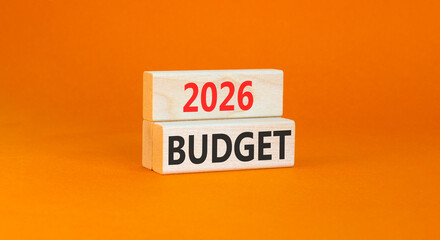 2026 Budget symbol. Concept words 2026 Budget on beautiful wooden blocks. Beautiful orange paper background. Business and 2026 budget concept. Copy space.