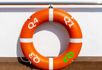 2nd second quarter symbol. Beautiful orange lifebuoy with words Q2 Q3 . Beautiful white background....