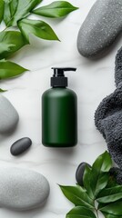 Minimalist skincare: green bottle with stones and leaves on marble background for natural beauty
