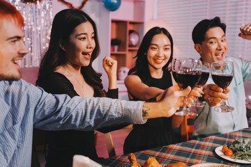 Diversity, dinner and group of people toast celebration together at party. Friends, happy and celebrate with food, wine and friendship for love, support and cheers champagne at business function