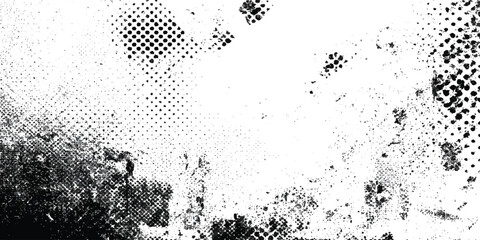 Abstract grunge halftone texture background black and white with speckle dots and paint splatters.