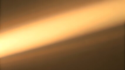Smooth Golden Gradient Background with Radiant Diagonal Light Beam Creating a Warm Luxurious Texture