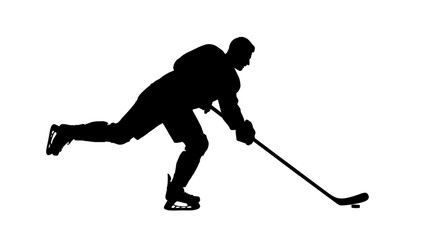 Fototapeta premium Silhouette of a hockey player skating and shooting