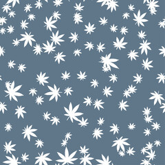 Seamless vector pattern of stylized white cannabis leaves randomly scattered on a muted blue-grey background for textile or wallpaper design