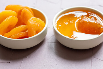 Close-Up of Apricot Jam and Dried Apricots in a Small Bowl
