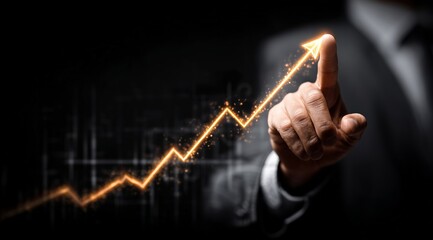 Businessman Indicating Growth with Finger on Graph