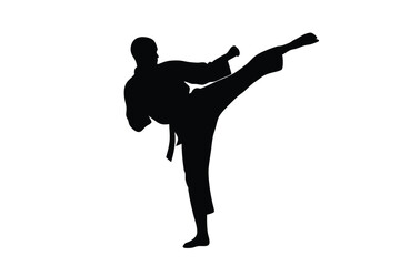 Focused karate athlete showcasing a powerful kick wearing traditional uniform is ready for a fight