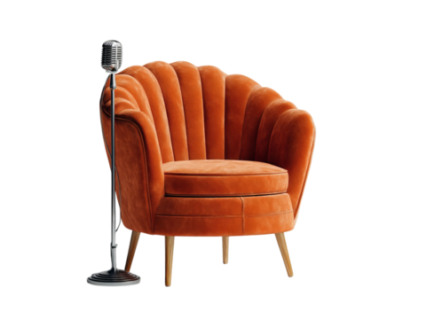PNG of Stylish orange velvet chair with a retro microphone, perfect for a cozy performance setting.