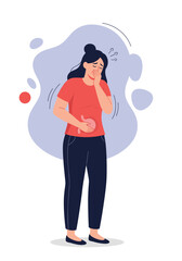 A young woman experiences discomfort and pain in her stomach region.