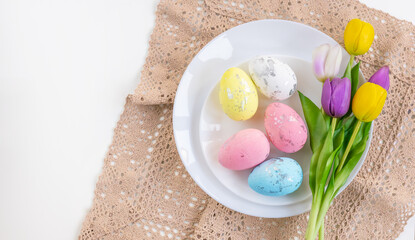 Easter celebration concept. Top view vertical white yellow plate eggs, isolated background, banner
