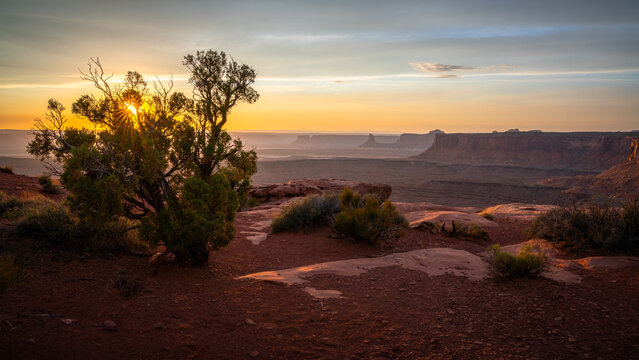 sunset at grand view point overlook near moab in canyonlands island in the sky in utah, usa