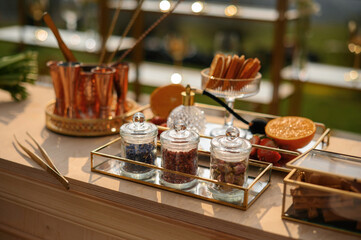 Elegant Outdoor Bar with Spices and Copper Mugs