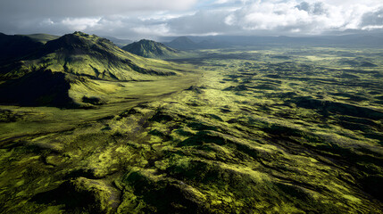 Vast Green Volcanic Landscape Under Cloudy Sky