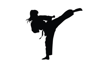 Silhouette showcases athletic woman powerfully executing a roundhouse kick during martial arts practice