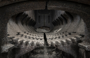 Demolished heating furnace in a abandoned building.