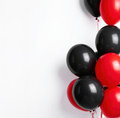 Red and black balloons floating celebrating party event