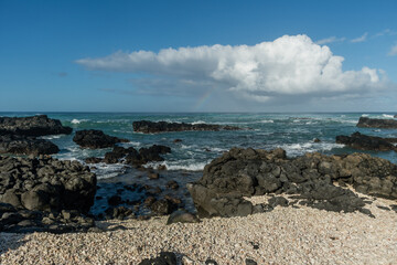 Scenic panoramic Kaena Point State Park vista with a beautiful rainbow in the background, Oahu, Hawaii
