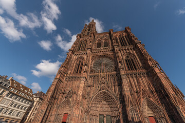Visit Notre-Dame Cathedral in Strasbourg under blue sky