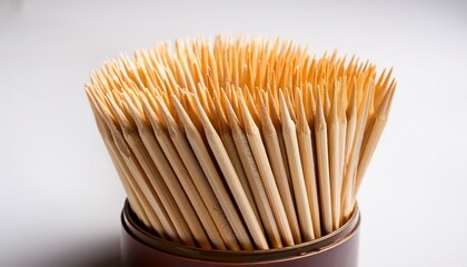 Wooden Toothpicks In A Box On A White Background Close Up