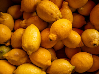 Fresh Lemons Piled Together for Sale in Market