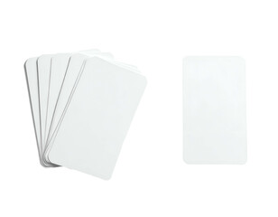 Blank white rectangular cards, fanned and single, set against a deep black background