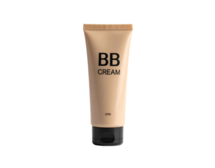 A tube of light-brown cosmetic product against a black background