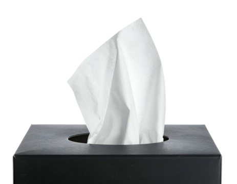 A close-up shot reveals a black box, housing a stack of white tissues