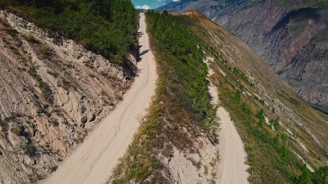 Aerial view dangerous road Katu Yaryk pass in Altai mountains, Chulyshman river gorge Russia.