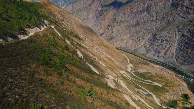 Aerial view dangerous road Katu Yaryk pass in Altai mountains, Chulyshman river gorge Russia.