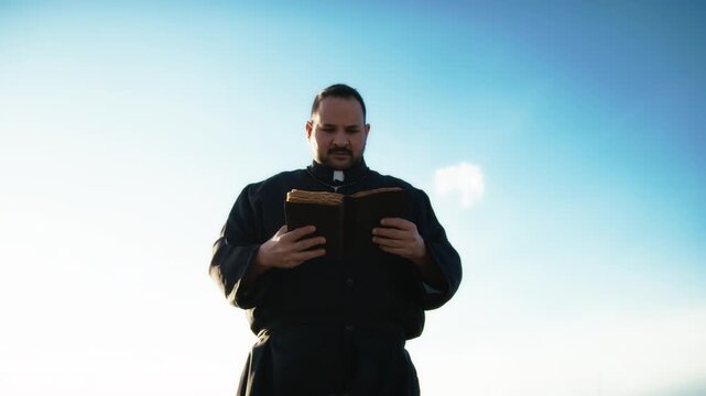 Deacon Blessing With The Bible In His Hands 