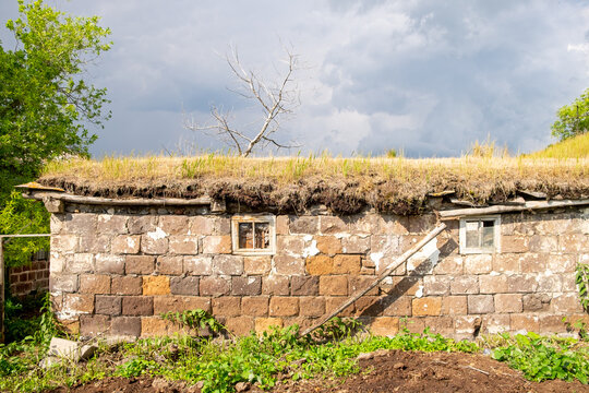 Paravani Lake, Javakheti, Georgia. 18 Jul. 2020. Stone building with grass roof