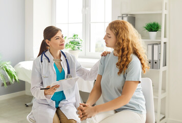 Doctor or nurse welcoming patient in a hospital office, offering healthcare support and advice. Medical appointment provides guidance, fostering patient trust within a professional environment.