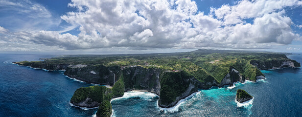 stunning Nusa Penida Bali aerial imagery showcasing dramatic cliffs bordering shimmering turquoise tropical waters